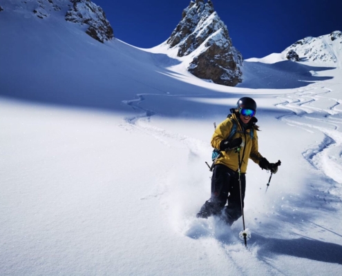 Snowy mountains with skier