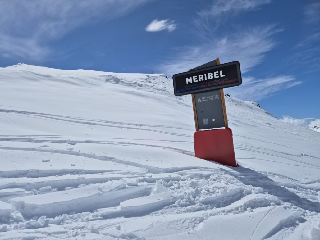 signpost in the snow for Meribel ski resort