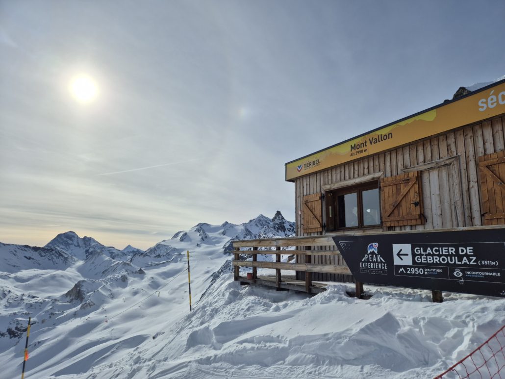 Mountain pisteur hut at the top of Mont Vallon in meribel, overlooking glaciers