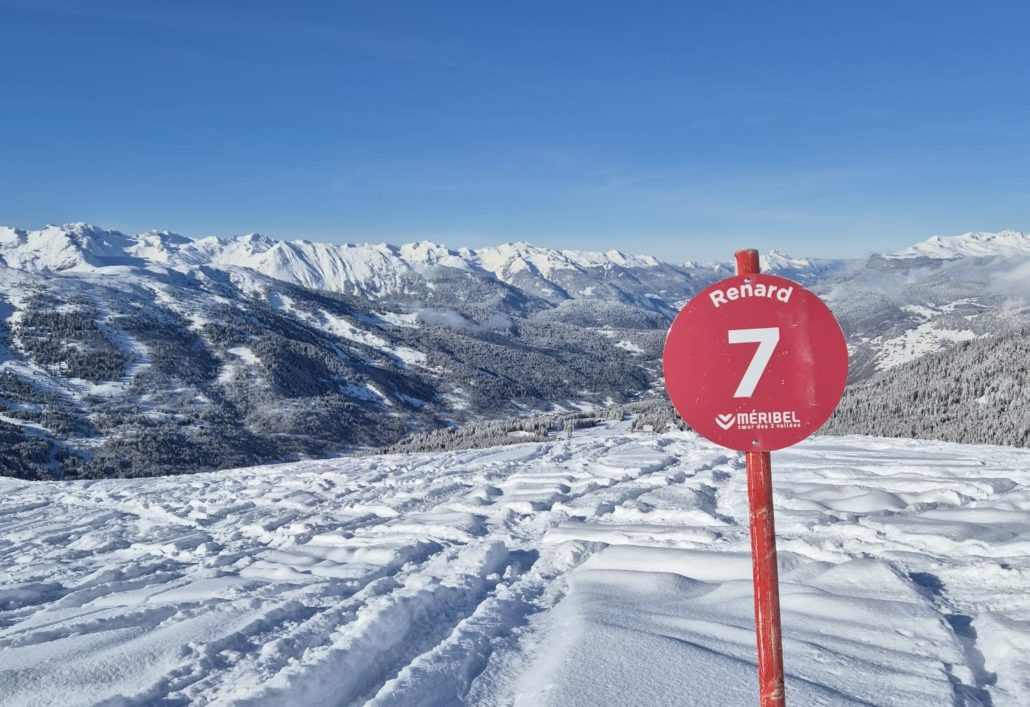 Red run ski piste sign in Meribel, Three Valleys