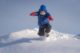 child jumping snow