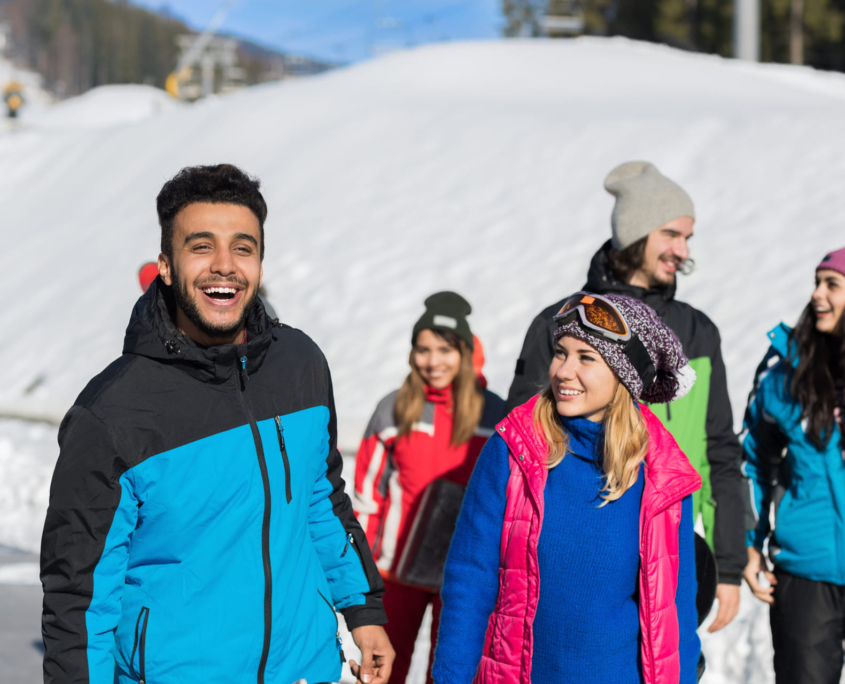 Group of people in snowy ski resort