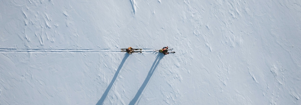 a person ski touring in the backcountry