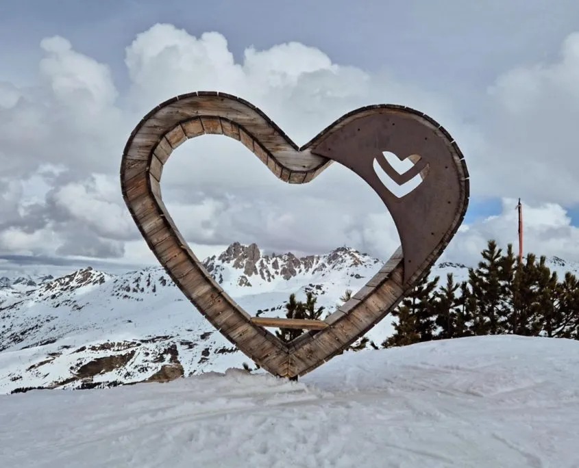 A wooden heart chair and sculpture in Meribel, Three Valleys ski area